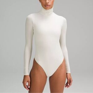 Lululemon | Wundermost Ultra-Soft Nulu Turtleneck Bodysuit in Bone Size Large